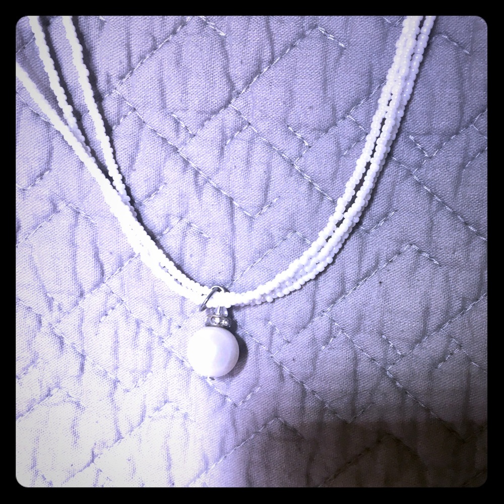Three strand white bead and Pearl Necklace.